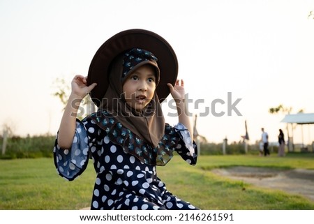 Portrait of Muslim girl in the farm