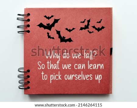 Why do we fall? So that we can learn to pick ourselves up. Inspirational and motivational quote. Believe in yourself concept.