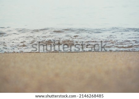 Sea wave on sandy beach morning sun light nature landscape