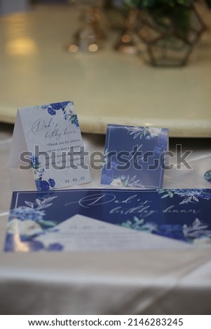 birthday invitation card placed on the event table