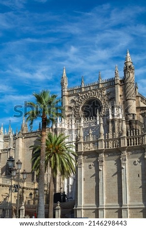 Old historical Andalusian town Seville, Spain. View on architectural details of Gothic cathedral church in summer