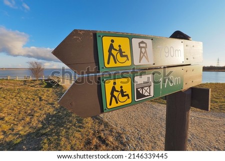 for people with disabilities signposts in the natural park.