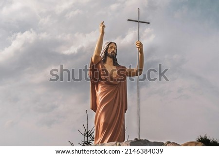 The statue of Jesus Christ with a cross (Christianity concept)