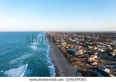 Aerial view of Nags head and the Atlantic ocean looking south at sunset Royalty-Free Stock Photo #2146399201