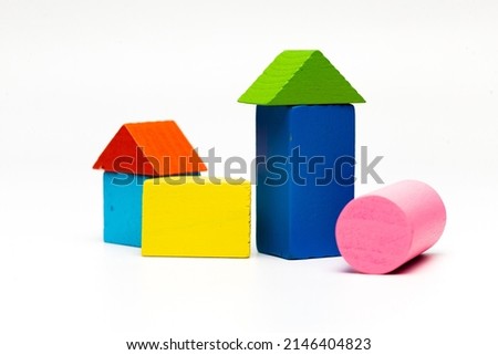 house toy blocks isolated white background, little wooden home, A partially constructed home, built from colorful wood blocks building isolated on white background. Colourfull shapes with blocks Royalty-Free Stock Photo #2146404823
