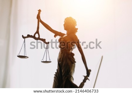 law books and scales of justice on desk in library of law firm. jurisprudence legal education concept. Royalty-Free Stock Photo #2146406733