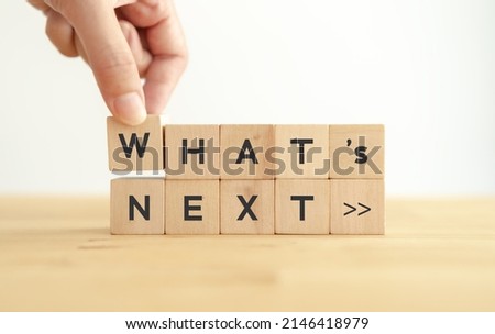 What's next?, business concept. Next step of work, plan, strategies, vision, project implementation, new opportunities and execution.  Putting wooden cubes with What's next?  and forward arrow symbols Royalty-Free Stock Photo #2146418979