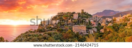 Landscape with Nonza village at sunset time, Corsica island, France