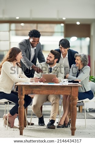Thats awesome. Cropped shot of a group of businesspeople meeting in the boardroom. Royalty-Free Stock Photo #2146434317