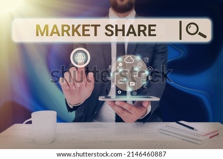 Hand writing sign Market Share. Business approach The portion of a market controlled by a particular company Man holding Screen Of Mobile Phone Showing The Futuristic Technology.