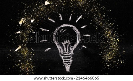 painted chalky light bulb wooden shavings