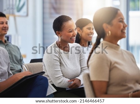 The journey towards success. Shot of a group of employees laughing during a meeting at work in a modern office. Royalty-Free Stock Photo #2146466457