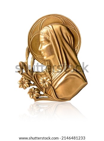 Bronze relief of the Virgin Mary as a bas-relief wall sculpture, details, close-up, metal bas-relief Image of the Mother of God with a relief portrait. Concept of religion and religious architecture.  Royalty-Free Stock Photo #2146481233