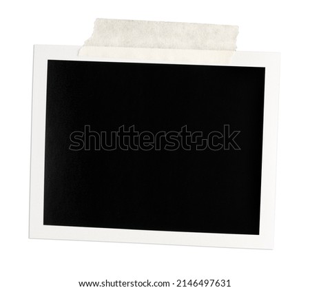 Blank Vintage instant photo frame with brown tape isolated on white background