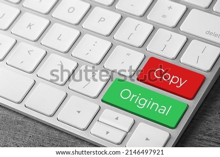 Color buttons with words Copy and Original on keyboard, closeup view. Plagiarism concept Royalty-Free Stock Photo #2146497921