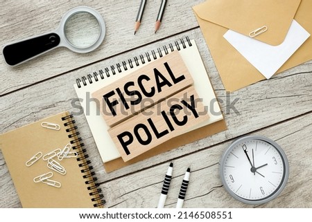 Fiscal policy Flat lay style. text on wooden blocks.