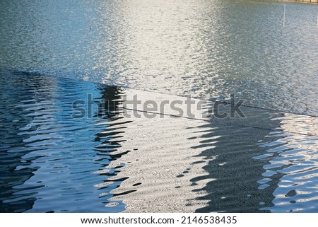 reflect in water and abstract form on water