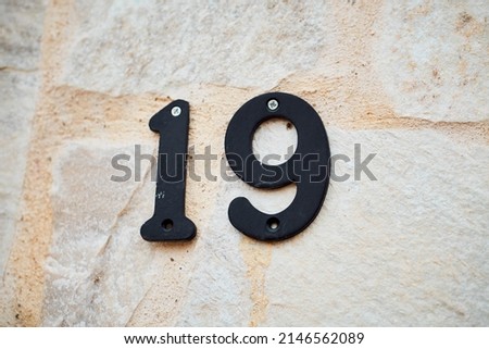 close up photo of a number on a wall