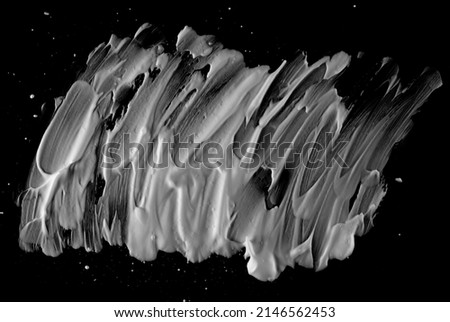 Foam, shaving cream bubble isolated on black, top view
