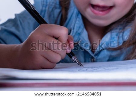 Young busiess child signed documents (humorous picture)