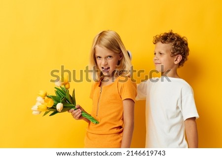boy and girl with a bouquet of flowers friendship gift