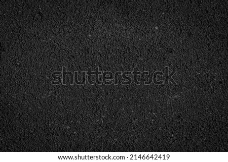 Black asphalt floor or road texture background. Royalty-Free Stock Photo #2146642419