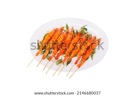 grilled shrimp on skewers on white background 