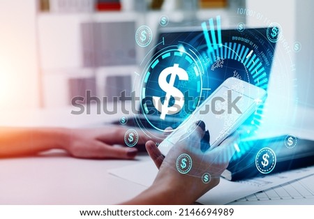 Businesswoman finger touch smartphone, hud with financial hologram and office room blurred. Cashback and money refund. Concept of online payment and money transfer Royalty-Free Stock Photo #2146694989