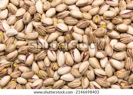 Full frame of pistachios, close up Royalty-Free Stock Photo #2146698403