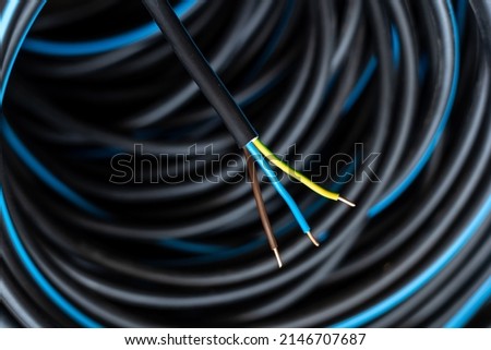 Electrical installation material, wires and cables for electrical wiring, high prices of building materials, CYKY-3x1,5 Royalty-Free Stock Photo #2146707687