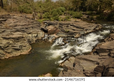 eroded rocky structures all over the sides of kanger dhara waterfalls at kanger valley national park, baster, chattisgarh, india