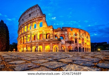 Coliseum morning in Rome, Italy. Colosseum is one of the main attractions of Rome. Coliseum is reflected in puddle. Rome architecture and landmark. Royalty-Free Stock Photo #2146724689