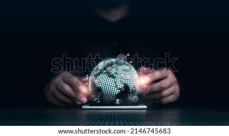 Investment technology with a global internet connection, financial, banking application, and big data network concepts. Hand using mobile smart phone with virtual digital earth and business icons.