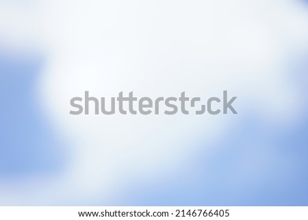 abstract blur bokeh background of white blue clouds
