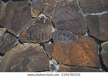 Background of brick stone wall texture. Close up image. Outdoor home decoration.