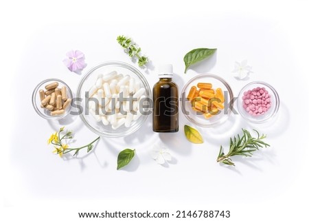 Flat lay composition of various vitamin capsules and dietary supplements isolated on white background. Vitamin complexes concept. Royalty-Free Stock Photo #2146788743