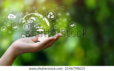 ESG icon concept. Environment, society and governance. Energy of natural gas sustainable and ethical business on network connection on green background. Royalty-Free Stock Photo #2146798615