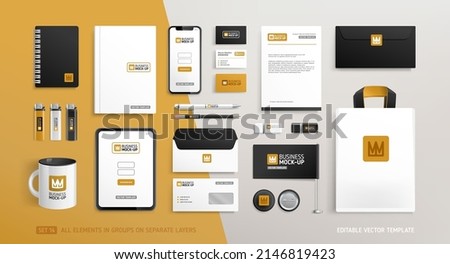 Stationery Brand Identity Mock-Up set with Crown logo design. Business office stationary mockup template of  annual report cover, tablet display, bag, brochure, souvenirs, etc. Editable vector Royalty-Free Stock Photo #2146819423
