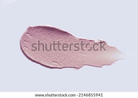 Pink cream concealer or clay mask sample isolated on gray background Royalty-Free Stock Photo #2146855941