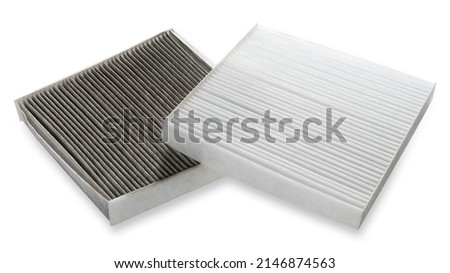 Car cabin air filter. Car air cleaning spare parts. Replace old one air filter on brand new for protect against Allergens, Pollen, Dust mites, Odors, Dirt, Soot, Bacterias, Viruses. High quality photo Royalty-Free Stock Photo #2146874563