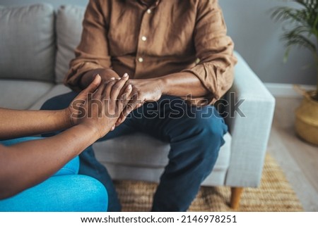 Professional care for elderly at nursing homes. Cropped shot of a female nurse hold her senior patient's hand. Close-up of home caregiver and senior woman holding hands Royalty-Free Stock Photo #2146978251