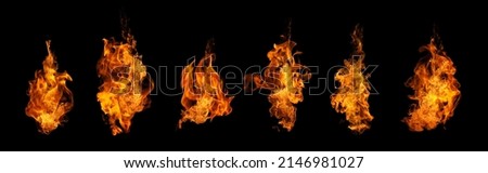 The set of fire and burning flame isolated on dark background for graphic design usage