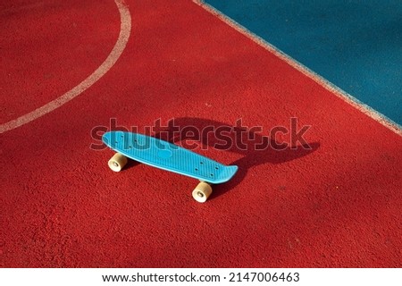 a skateboard on a colored floor