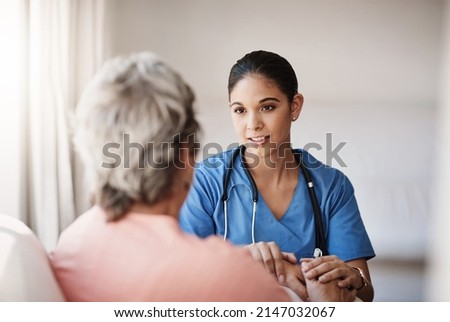 Im here for you...always. Cropped shot of an attractive young nurse holding a senior womans hands in comfort. Royalty-Free Stock Photo #2147032067