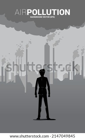 Businessman and smoke from city and factory. Concept for Air pollution and environment crisis. Royalty-Free Stock Photo #2147049845