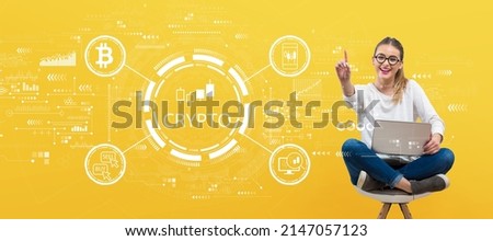Crypto Trading theme with young woman holding her laptop
