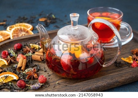 Fruit tea in a glass bowl. Healthy food, vitamins, antioxidants. Royalty-Free Stock Photo #2147058943