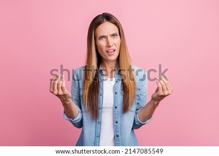 Photo of young lovely woman show fingers ask cash money symbol bankrupt isolated over pink color background