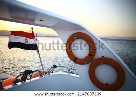 egypt flag on a yacht in the sea travel diving red sea