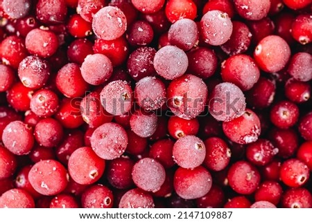 Cranberries. Frozen cranberry background, top view